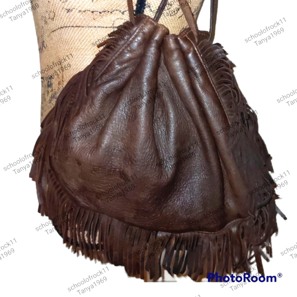 Vintage leather cinch bag with fringed trim - Picture 2 of 9